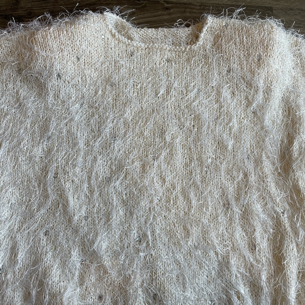sparkle with 80s vibe. Hand knit sweater.